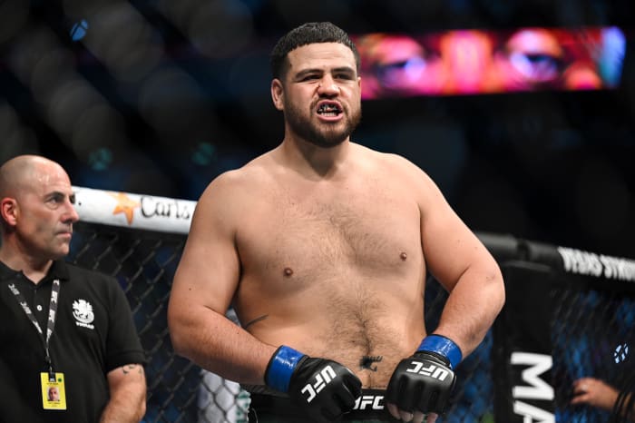 Tai Tuivasa (blue gloves) is introduced before fighting Ciryl Gane during UFC Fight Night at Accor Arena.